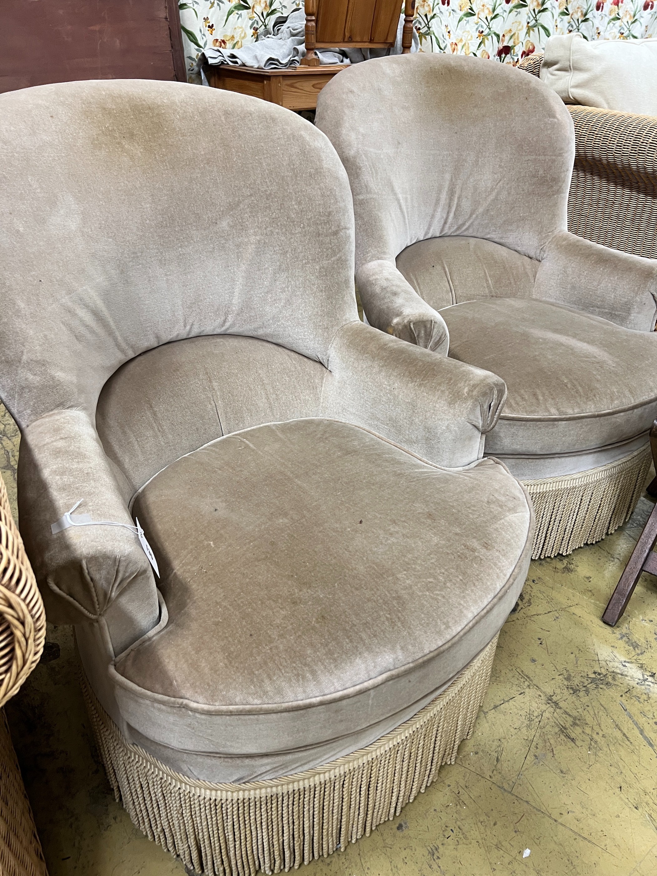 A pair of upholstered tub framed side chairs, width 70cm, depth 70cm, height 88cm